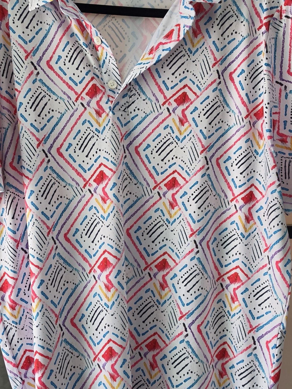 White Golf Shirt with Multicolor Geometric Print
